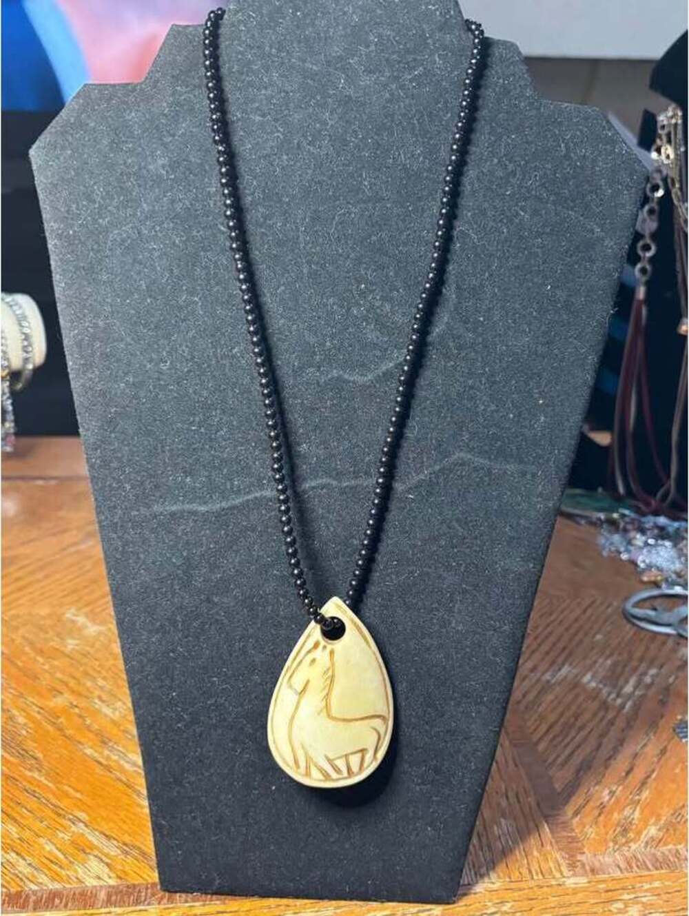 Carved Horse Pendant Necklace with Black Beads